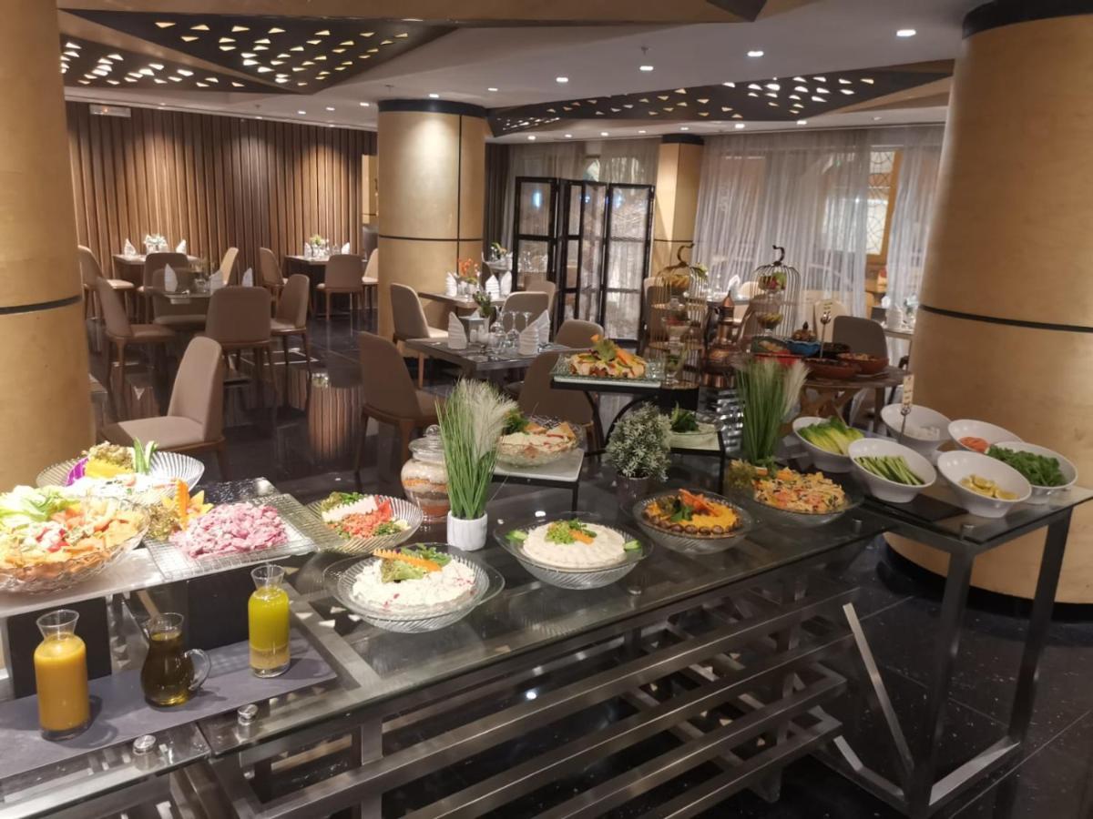 Grand Plaza - Takhasosi